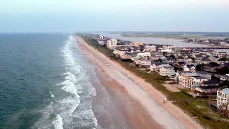 Wrightsville-Beach-NC,-North-Carolina-aerial-push-into-beach-and-homes