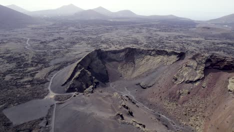 Aerial-shot-of-huge-dormant-volcano,-volcanic-landscape-4k