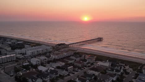 Aerial-tilt-down-at-sunrise-wrightsville-beach-nc,-north-carolina