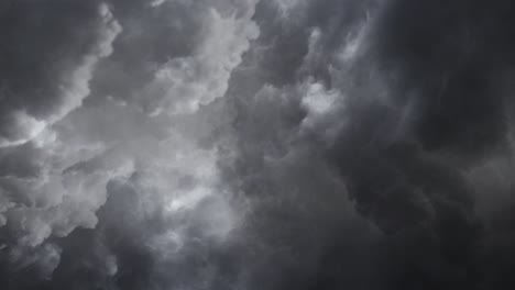View-of-flying-through-dark--cumulonimbus-clouds,-thunderstorm