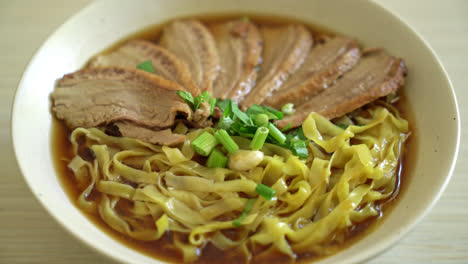 Egg-noodles-with-stewed-duck-in-brown-soup---Asian-food-style-1