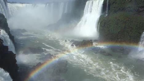 Majestic-Iguazu-falls,-with-rainbow-and-birds,-in-Brazil-Argentina-border