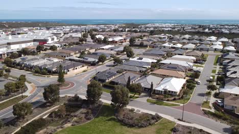 Aerial-Pan-Right-Shot-Over-Butler-Suburb-Perth-With-View-Of-The-Ocean