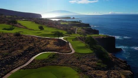 Gorgeous-cliffside-Manele-Golf-Course-in-Lanai,-Hawaii---aerial-pullback