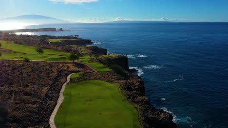Manele-Golf-Course-atop-scenic-cliffs-overlooking-azure-ocean,-Hawaii
