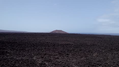 Huge-lava-fields-and-black-rocks,-aerial-footage