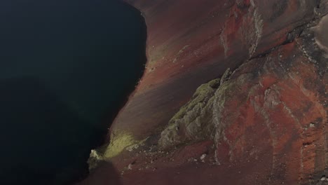 Aerial-tilt-up-shot-extreme-crater-with-lake-named-Ljotipollur-in-Iceland