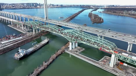 Heavy-traffic-on-newly-constructed-Champlain-bridge-while-demolishing-the-old-one,-Montreal,-Canada