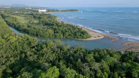 Aerial-view-of-mouth-of-the-river-of-Rio-Munoz-and-Caribbean-Sea-in-Dominican-Republic