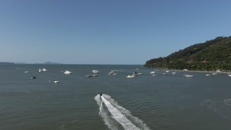 Boats-Floating-And-Sailing-On-Sea-Surface-Off-The-Coast-Of-Balneario-Camboriu-In-Brazil