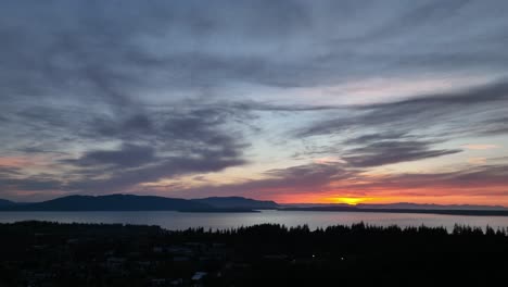 Drone-shot-of-the-sun-setting-over-Lummi-Island