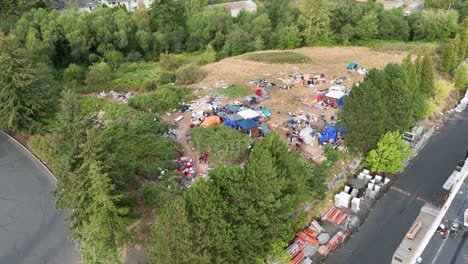Aerial-shot-of-a-homeless-community-with-junk-strewn-everywhere