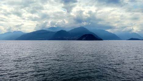 Drone-shot-of-amazing-Italian-Alps-and-beautiful-Lake-Como-water