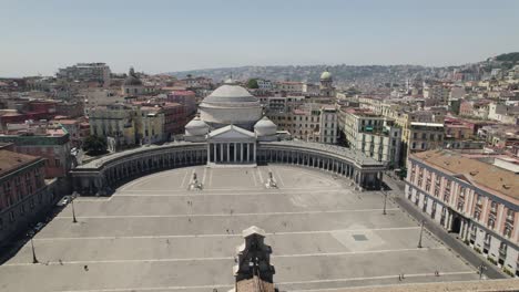 Aerial-view-Piazza-del-Plebiscito-square-in-Naples-on-sunny-day,-City-sprawling-in-Background