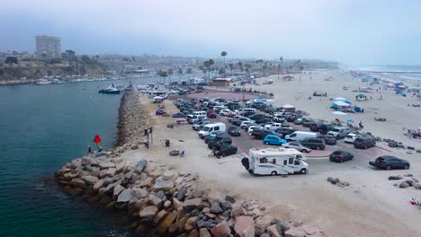 Drone-shot-oceanside-harbor-from-water-to-big-circle