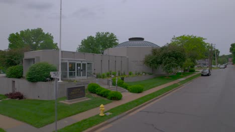 Drone-crane-shot-on-a-rainy-day-of-the-Liberty-Jail-a-Mormon-Visitor-Center-in-Liberty-Missouri