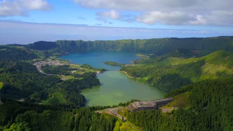 Aerial-smooth-view-of-Sete-Cidades-twin-lakes-in-the-crater-of-a-dormant-volcano-on-the-Portuguese-island-of-Sao-Miguel,-Azores