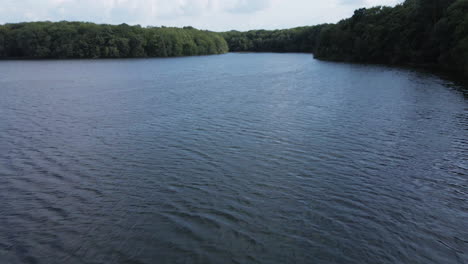 Trémelin-or-Tremelin-lake-and-surrounding-forest,-Brittany-in-France