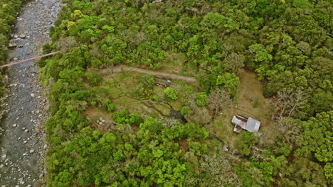 Caldera-Panama-Aerial-v7-cinematic-birds-eye-view,-drone-rotating-flyover-natural-hot-springs-hidden-in-wild-nature-along-chiriqui-river-at-paja-de-sombrero---Shot-with-Mavic-3-Cine---April-2022