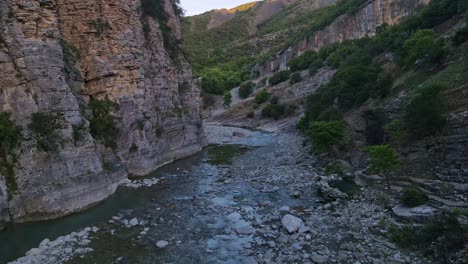 Aerial-forward-through-Langarica-canyon-Vjose-river-Permet,-Albania