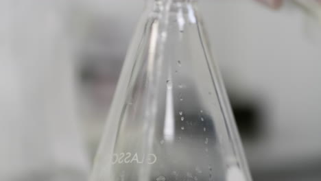 Scientist-Experimenting-Water-Treatment-Purity-Test-In-A-Science-Lab