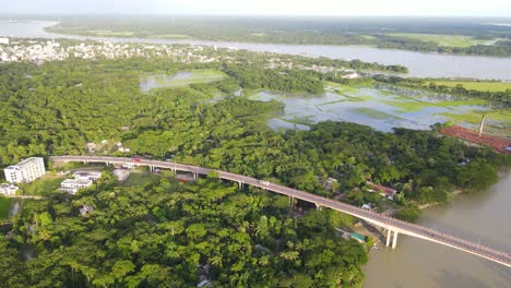 Aerial-view-of-lush-vegetation-landscape,-Viaduct-over-river-in-Gabkhan