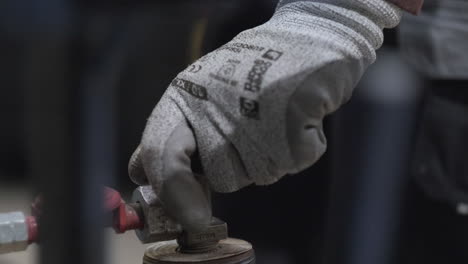 Worker-Wearing-Safety-Gloves-Opens-A-Industrial-Gas-Propane-Cylinder