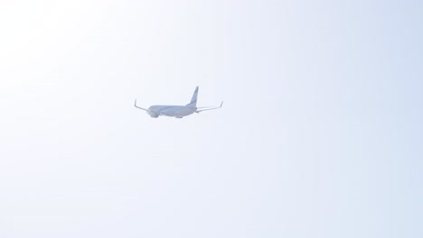 El-Al-Boeing-Aircraft-Flying-In-The-Sky-With-White-Clouds