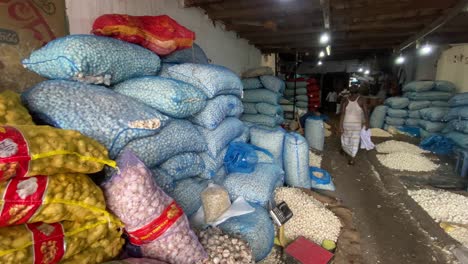 Stacked-Sacks-Of-Garlic-And-Ginger-In-Market-Storehouse-In-Bangladesh