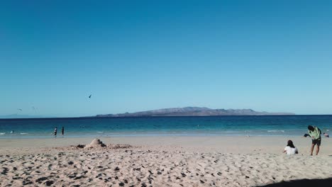 Tecolote-Beach-People-Relaxing,-View-Spirit-Santo-Island,-Baja-California-El-15-De-Enero
