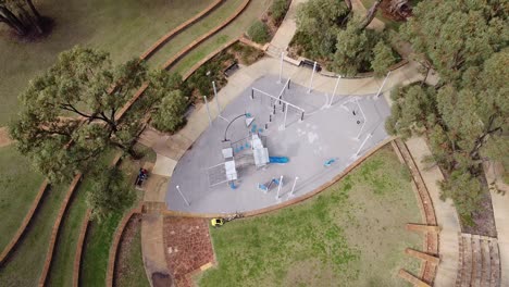 Aerial-Tilt-Down-View-Over-Round-Play-Area,-Las-Ramblas-Park,-Perth-Australia