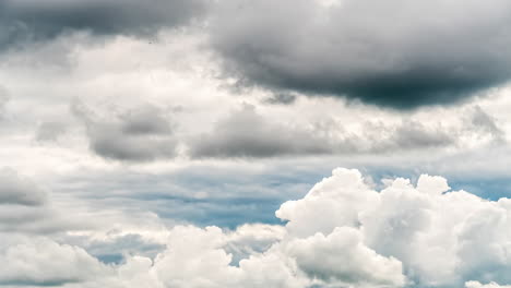 Timelapse-shot-of-fast-clouds-moving-along-cinematic-sky-background-at-daytime