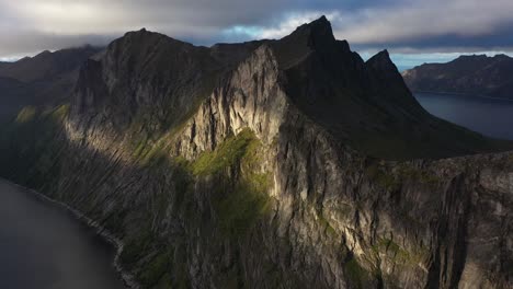 Aerial-view-of-dramatic-cliffs-in-Senja-island,-Norway