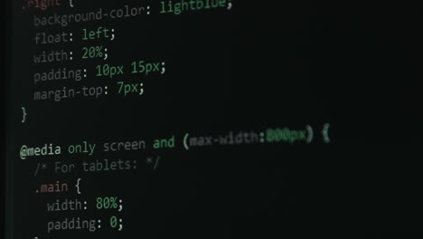 Code-Bildschirm-Mit-Verschiedenen-Farben,-Die-Mit-HTML-Pixeldetails-In-Nahaufnahme-Navigiert-Werden