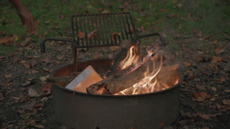Slow-motion-footage-of-a-fire-in-a-fire-ring-at-a-campground