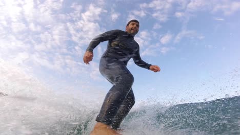 SLOW-MOTION:-Extreme-surfer-surfing-inside-medium-tube-barrel-wave