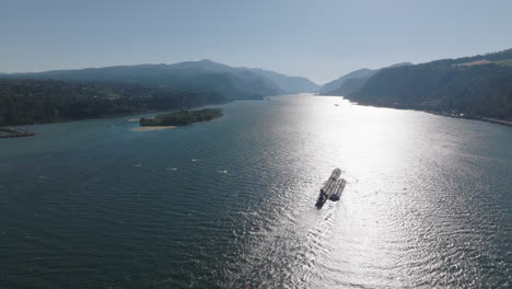 Drone-aerial-of-a-barge-traveling-down-the-Columbia-River-Gorge