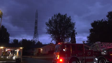 Fire-trucks-on-scene-during-a-stormy-night