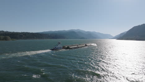 Drone-aerial-of-a-barge-traveling-down-the-Columbia-River-Gorge-1