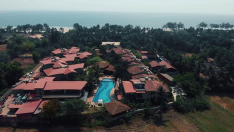 Cinematic-Drone-shot-flying-off-a-resort-in-Goa,-India