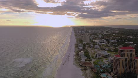 Static-aerial-view-of-the-white-sand-beach-in-San-Destin-Florida-during-golden-hour