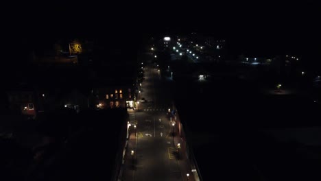 A-fly-over-shot-of-front-street-in-Bath-Maine-at-night