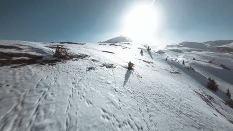 FPV-aerial-shot-of-the-Swiss-alps-snowy-mountains