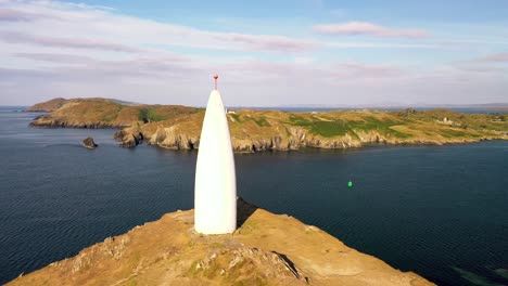 360-degree-aerial-view-around-The-Baltimore-Beacon-in-South-West-Cork-on-a-sunny-day