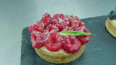 Raspberries-custard-mini-cake-with-mint-leaves