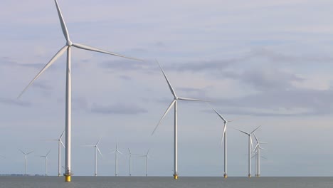 Turning-Wind-Turbines-at-Fryslan-Wind-Farm,-Ijsselmeer,-The-Netherlands