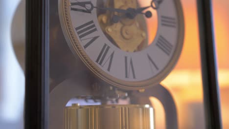 Vintage-antique-pendulum-clock-with-roman-numerals-Close-up