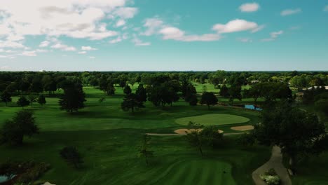 Low-Drone-Flight-Over-Freshly-Cut-Golf-Field-Lined-With-Full-Grown-Trees,-Northbrook-,-Illinois,-Chicago