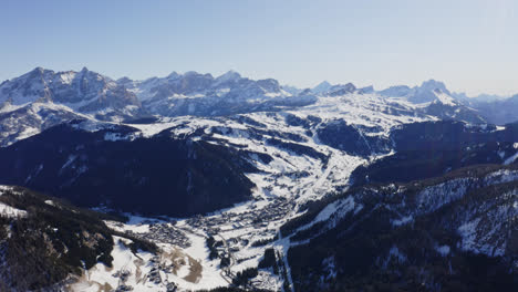 Aerial-Panorama-Of-Snow-Covered-Ski-Resort-In-Dolomites-Mountains-In-Italy