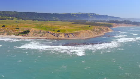 Aerial-View-Of-Waves-Crashing-On-Bolinas-Point-Near-The-RCA-Beach-In-Bolinas,-California,-USA